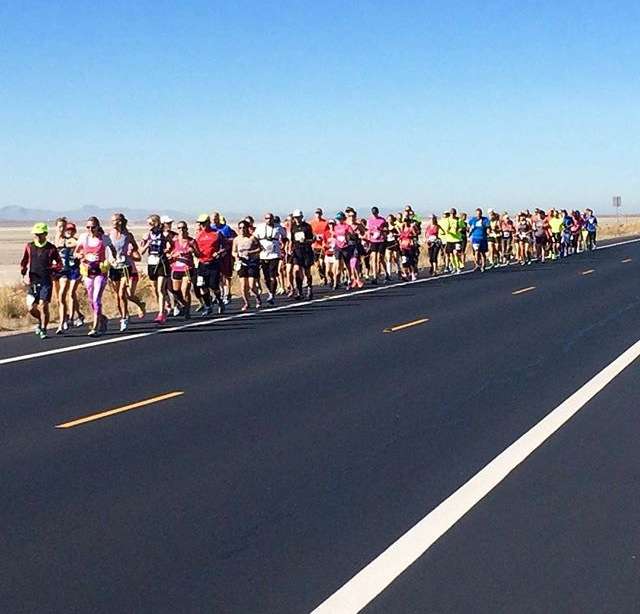 Runners all tied together on the course of the Layton Marathon for the world record attempt. (Photo: Joe Coles/www.onhillevents.com)