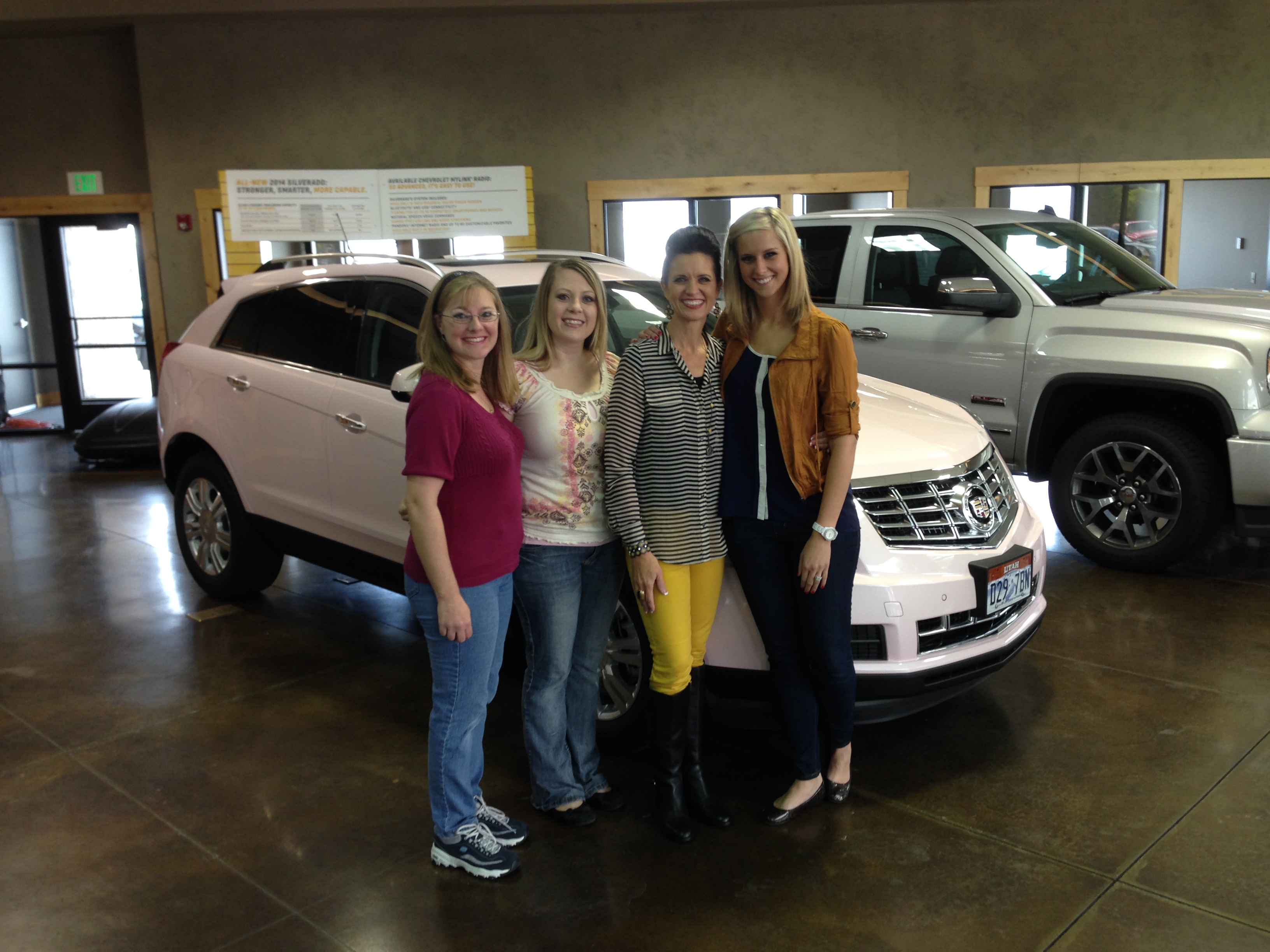 Julie Griffin with her fifth pink Cadillac. Photo courtesy of Julie Griffin