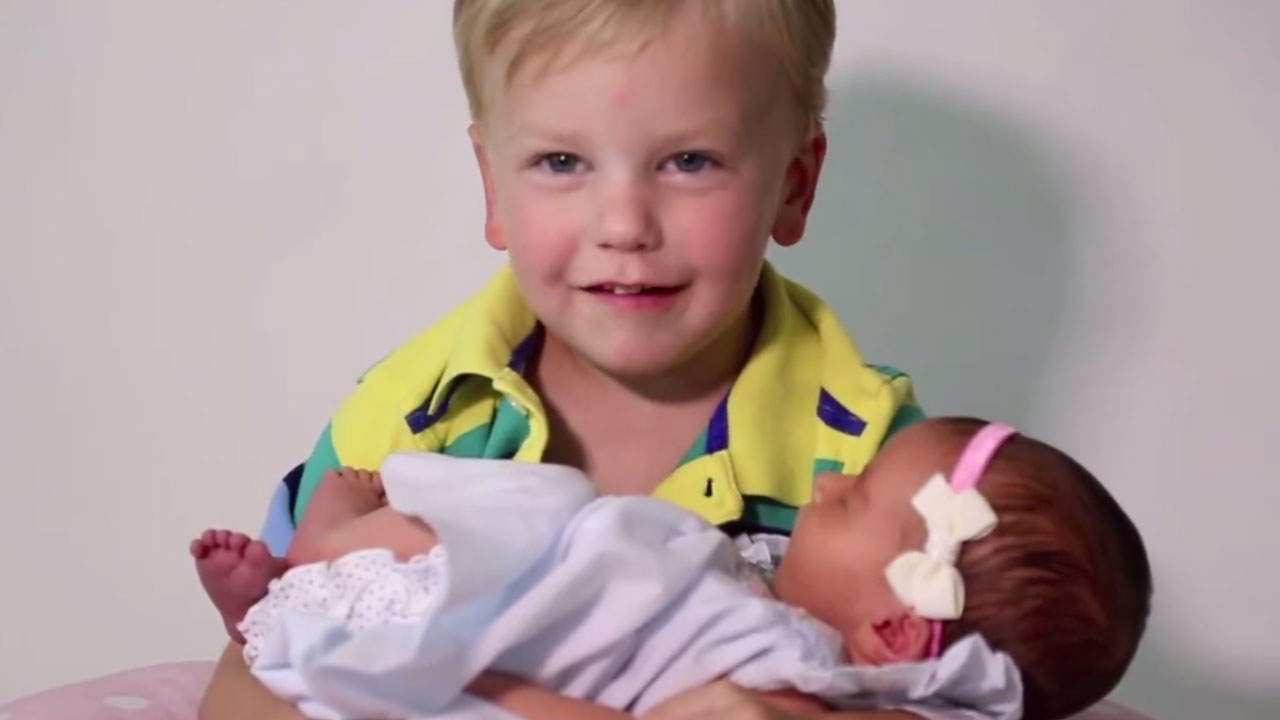 6 brothers coo over new baby sister in viral video