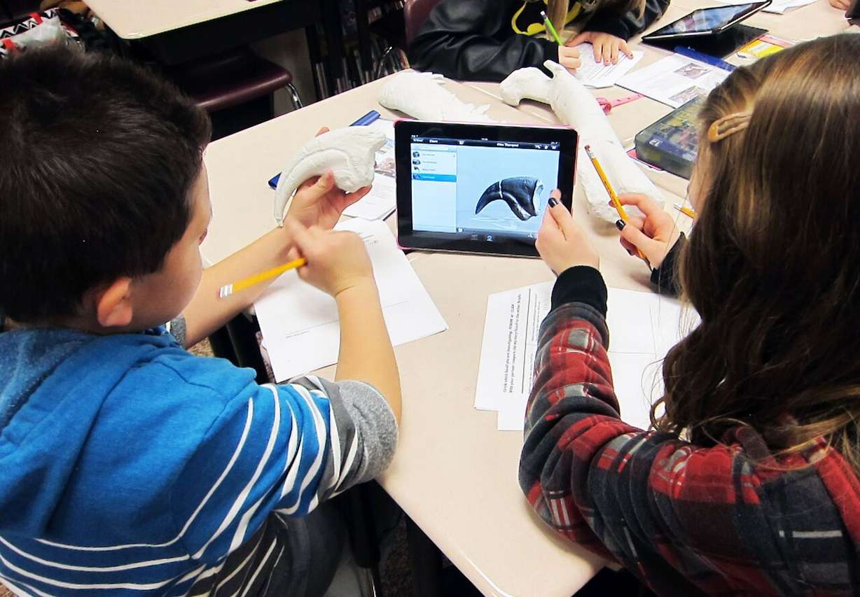 Granite school district middle school students try out Research Quest, a gaming program designed by the Natural History Museum to teach students critical thinking skills. The program will be piloted in Granite, Jordan, Davis and Weber School districts this fall. (Photo: Natural History Museum of Utah)