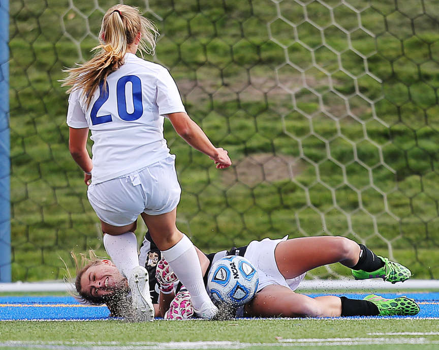 Davis keeper Kendyl Baker stops a shot by Fremont's Kinsley Napoli Tuesday, Oct. 20, 2015, in 5A soccer Semifinal action at Juan Diego High School in Draper. (Photo: Scott G Winterton, Deseret News)