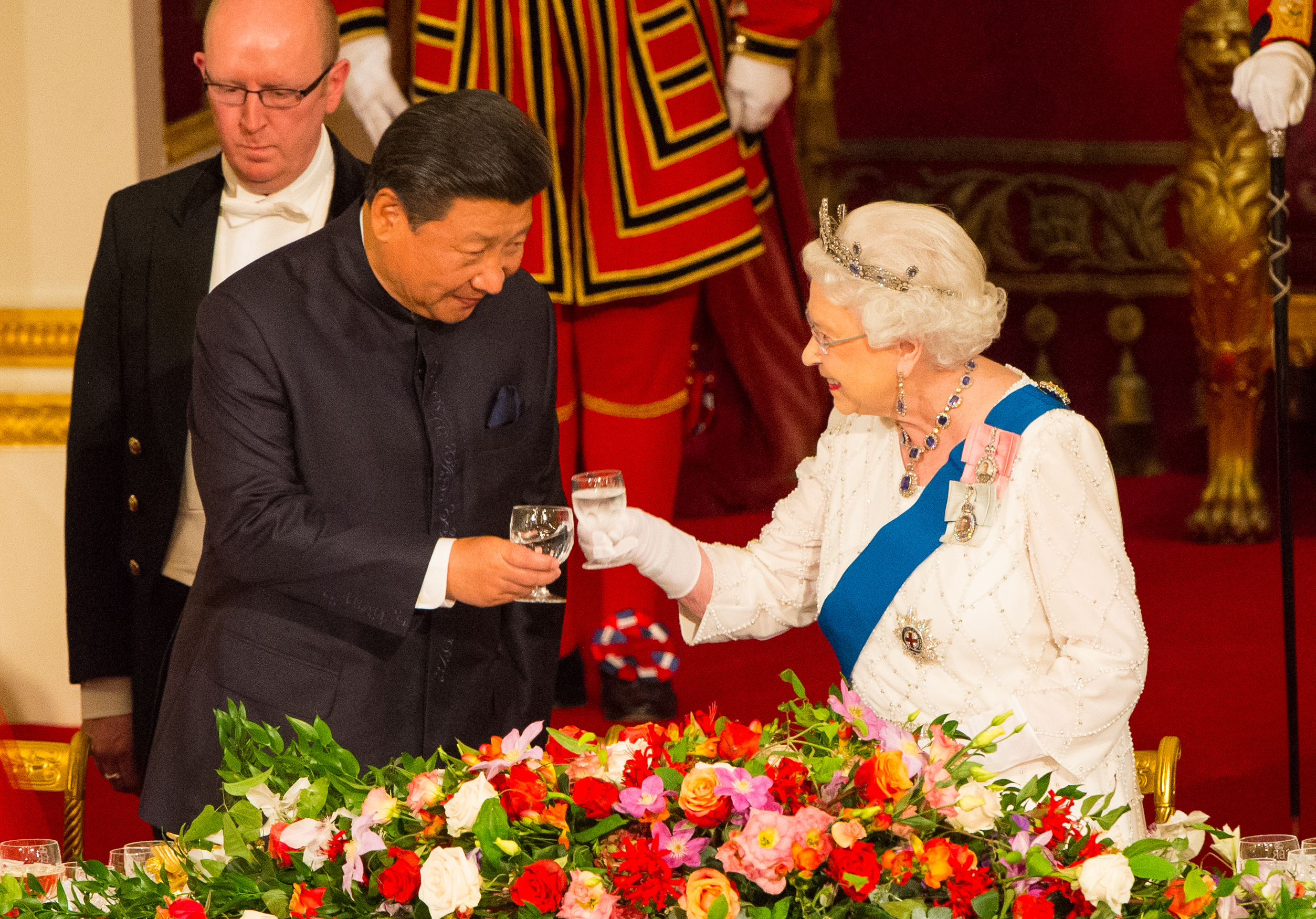 The Latest: China' Xi attends London banquet in his honor