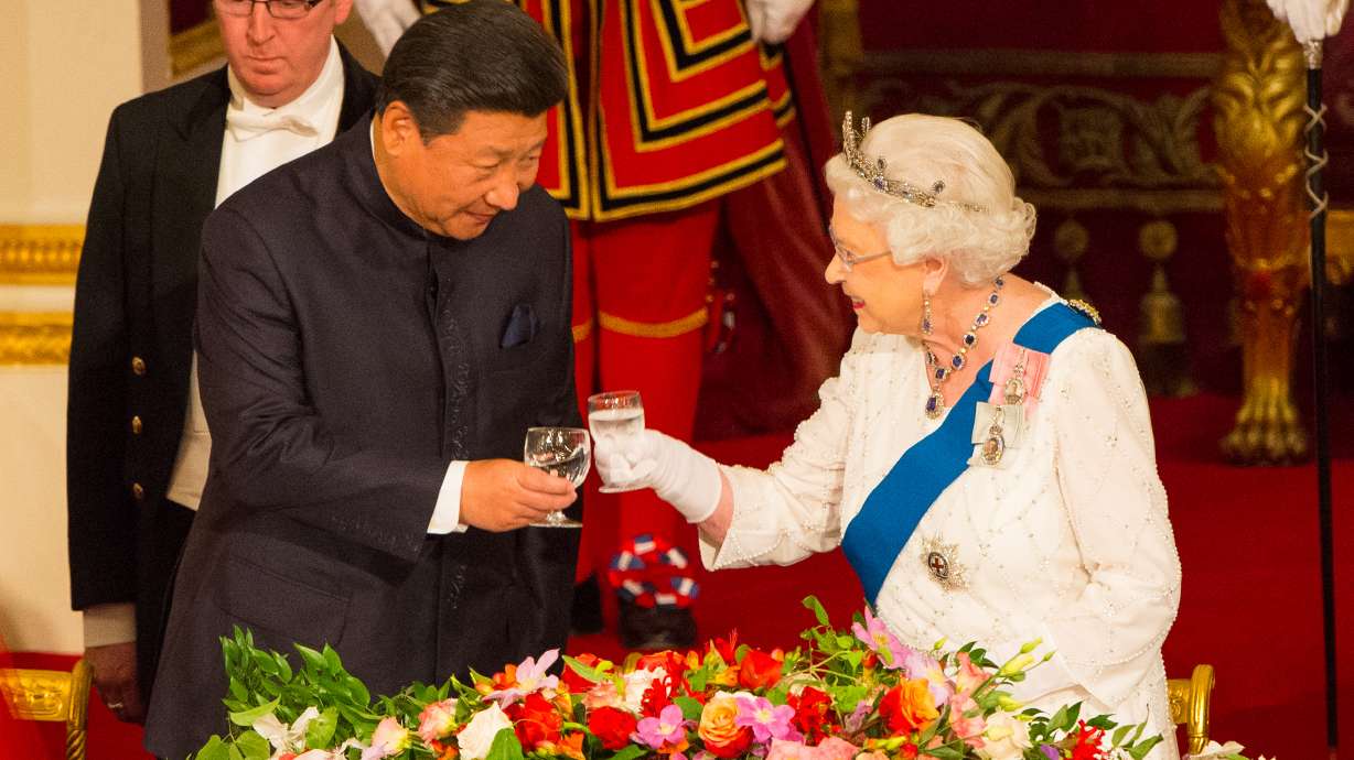 The Latest: China' Xi attends London banquet in his honor
