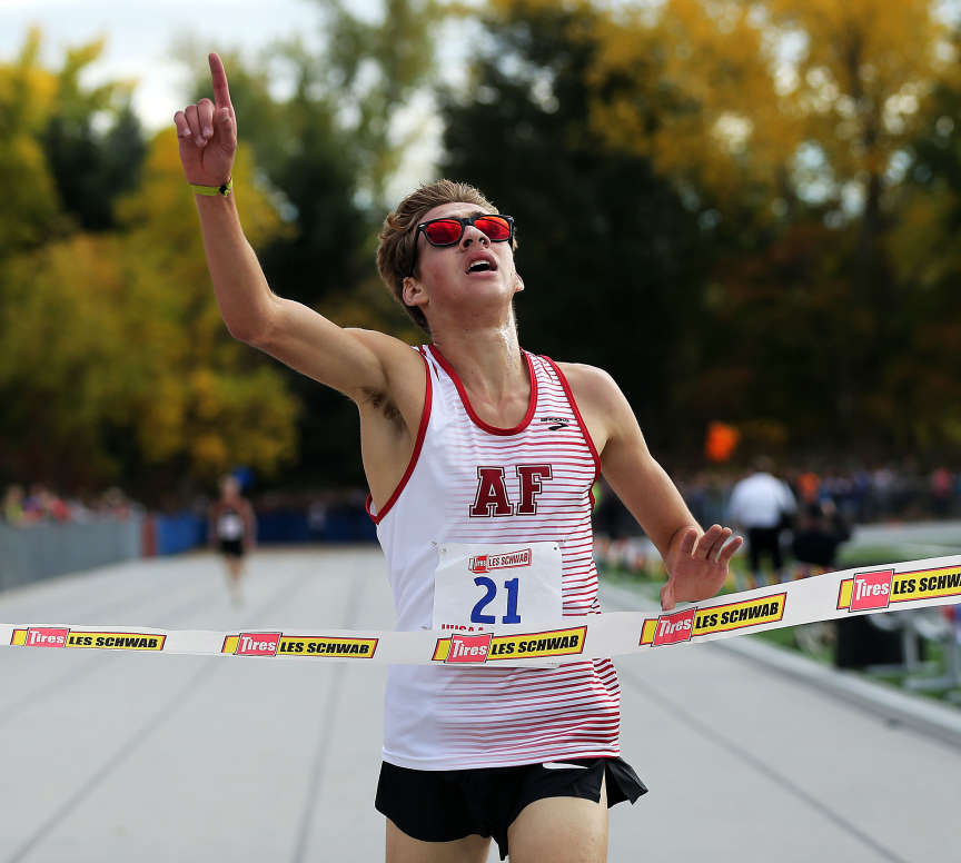 Casey Clinger of American Fork High School wins the boys 5A state high school cross country championship in Salt Lake City, Wednesday, Oct. 21, 2015. (Ravell Call/Deseret News)