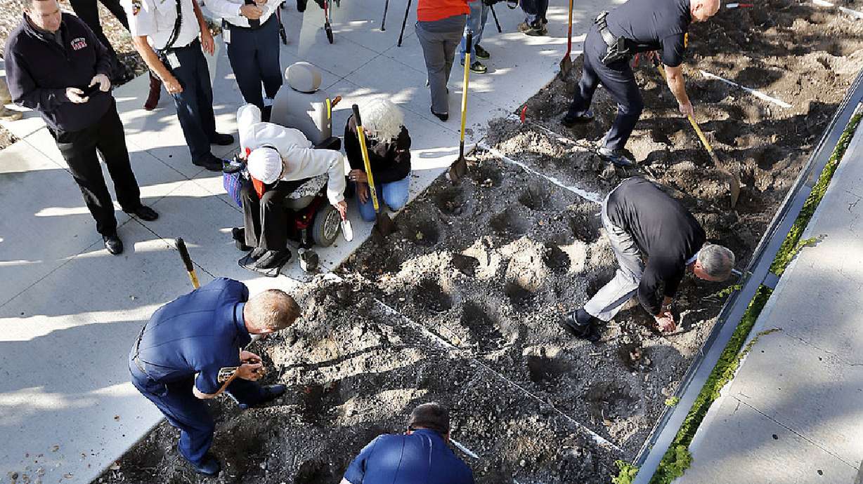 Salt Lake leaders remember victims of gun violence, plant daffodils in their honor