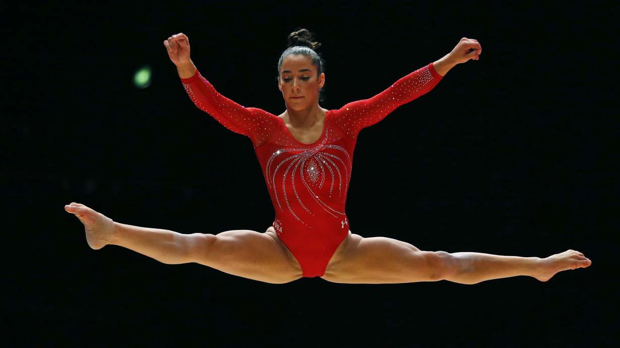 US women roll to 3rd straight world gymnastics title