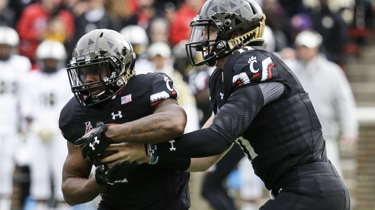 Cincinnati pummels Central Florida, Barrett, 52-7