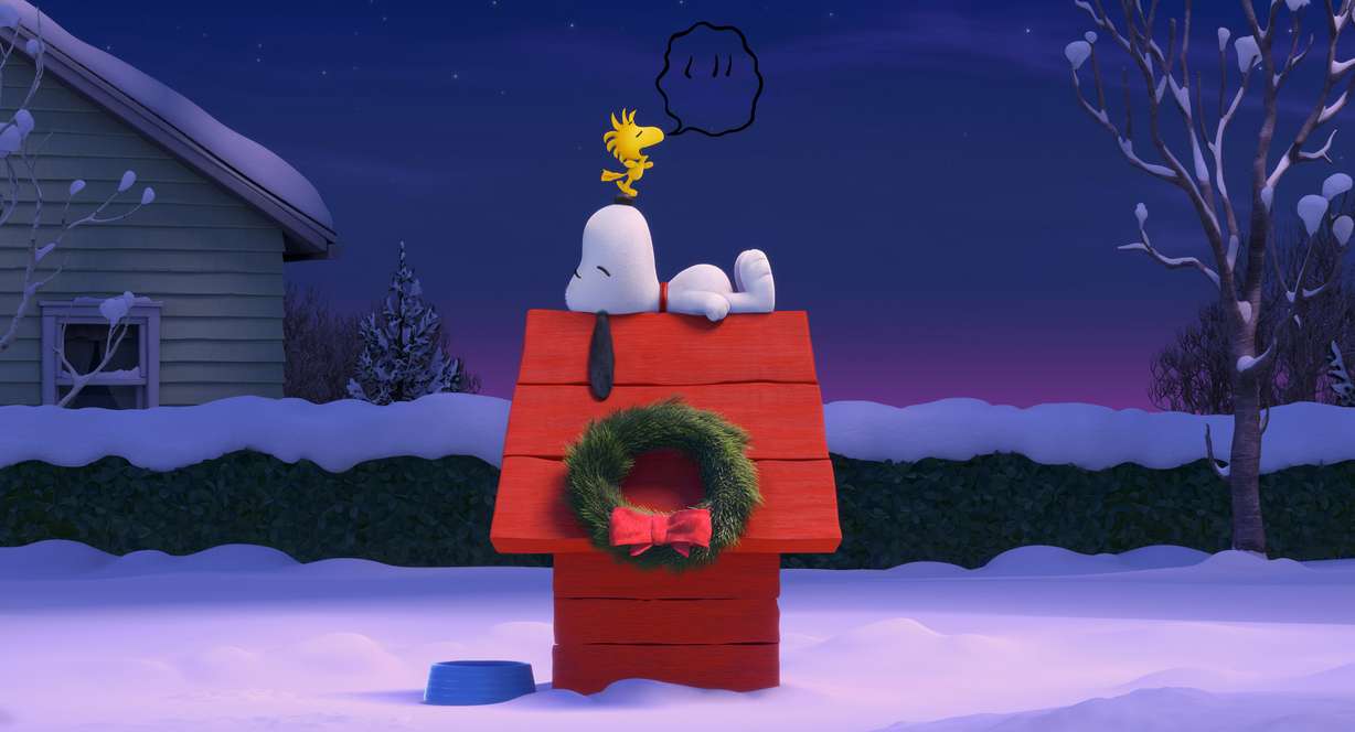 In this photo provided by Twentieth Century Fox & Peanuts Worldwide LLC, before their next big airborne adventure, Snoopy and Woodstock have a quiet moment in the new film, "The Peanuts Movie." The movie releases in U.S. theaters Nov. 6, 2015. (Twentieth Century Fox & Peanuts Worldwide LLC via AP)