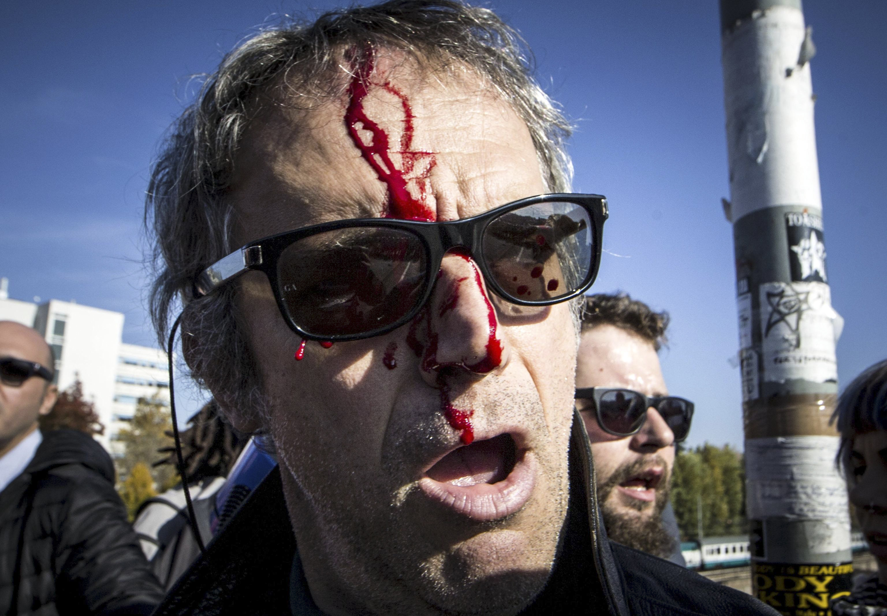 Protesters clash with police in Bologna
