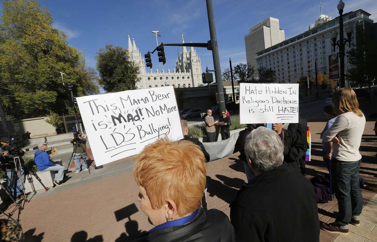 A group rallies near Temple Square in Salt Lake City Sunday, Nov. 8, 2015. The group was protesting the LDS Church's new policies regarding same-sex couples and their children. (Photo: Jeffrey D. Allred, Deseret News)