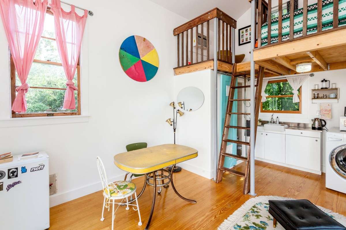 This little home in Austin, Texas, was built to serve as a guest house across the yard from owner Erin Gentry's 1928 bungalow. Her family started renting it out on Airbnb for $100 per night, and it's been a hit with guests. Outside, guests can lounge on the spacious patio. The house is in East Austin, two blocks from a light rail station. (Photo: Sarah Natsumi Moore/Courtesy AirBNB)