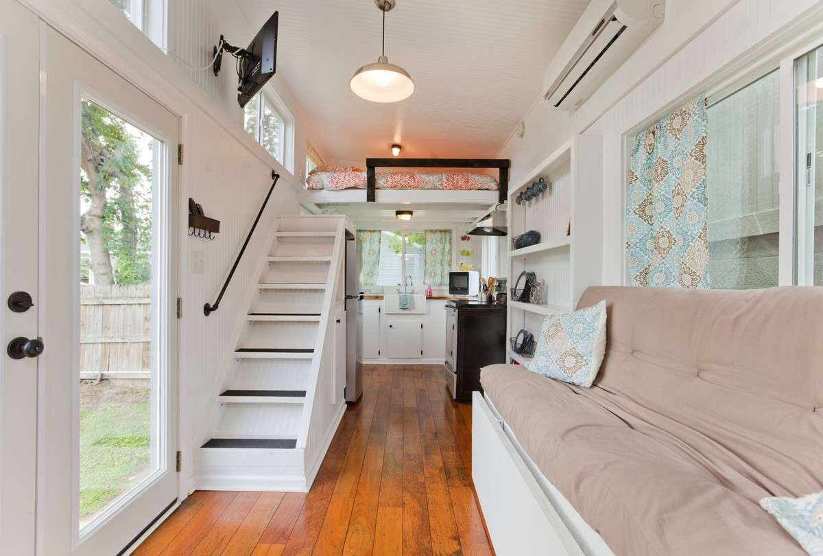 This light and airy tiny home in Nashville sleeps four and has a full kitchen. The house rents for $119 per night. (Photo: Courtesy AirBNB)