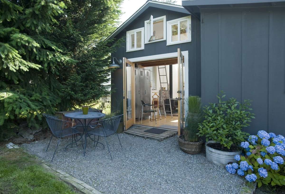 This 285-square-foot cottage is 6 1/2 miles from the heart of Seattle. In addition to a freestanding wood fireplace, this property boasts a large bathroom with a skylight and soaking tub. It rents for $100 per night. (Photo: Rick Barry/Courtesy AirBNB)