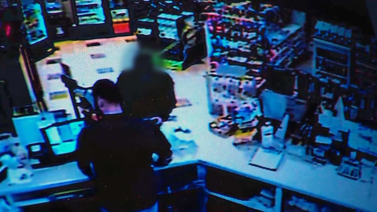 Surveillance footage of the alleged identity thief