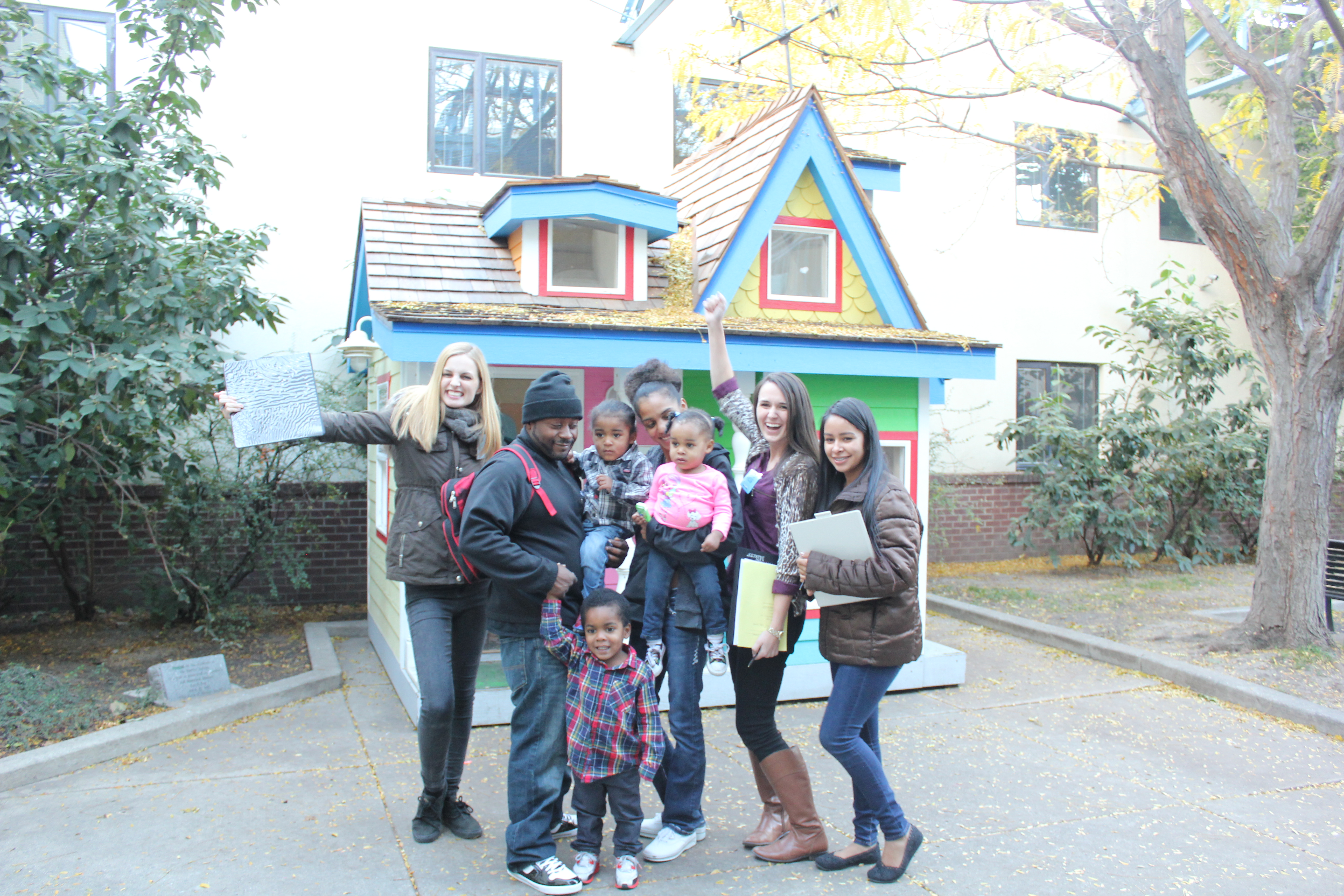 Volunteers create customized books for homeless children