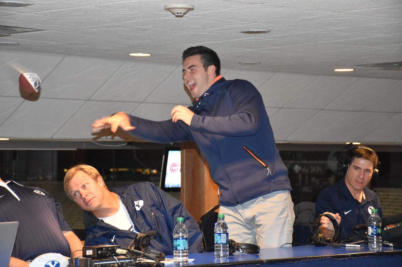 Tanner Mangum starts an interview with radio host Greg Wrubell with an incomplete pass during the "BYU Football with Bronco Mendenhall" coach's show Tuesday night at LaVell Edwards Stadium. (Photo: Elora Grant, IMG)