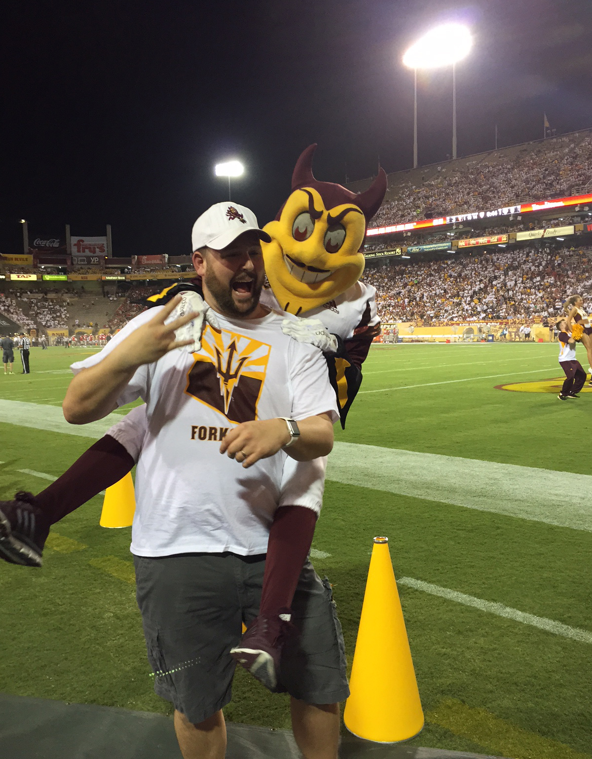 Official seeks $123,000 after university mascot jumps on him