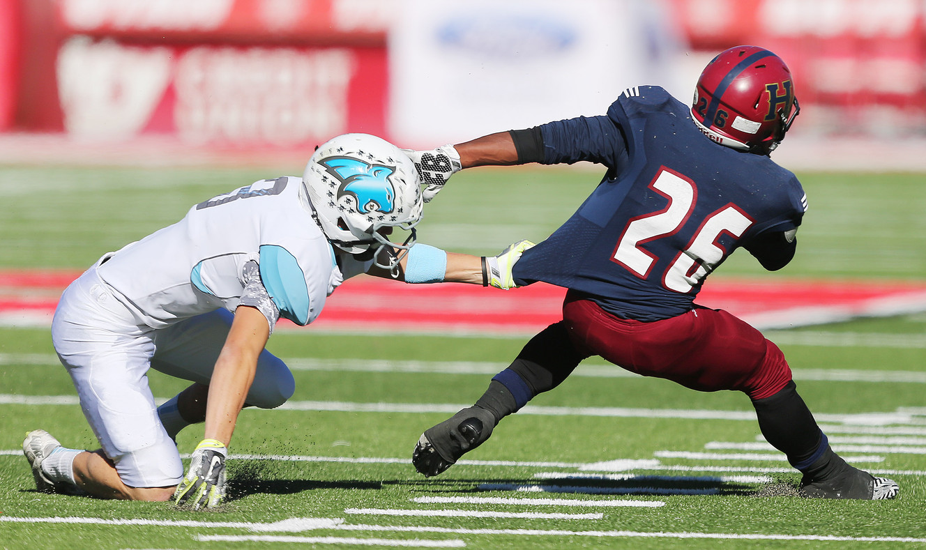 Sky View and Herriman play in the 5A high school state semifinal football game at Rice-Eccles Stadium in Salt Lake City Friday, Nov. 13, 2015. Herriman's Jake Jutkins scrambles for a play. (Photo: Jeffrey D. Allred/Deseret News)