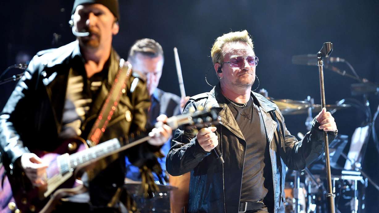 U2 'shocked' by deadly Paris attacks, cancels concert