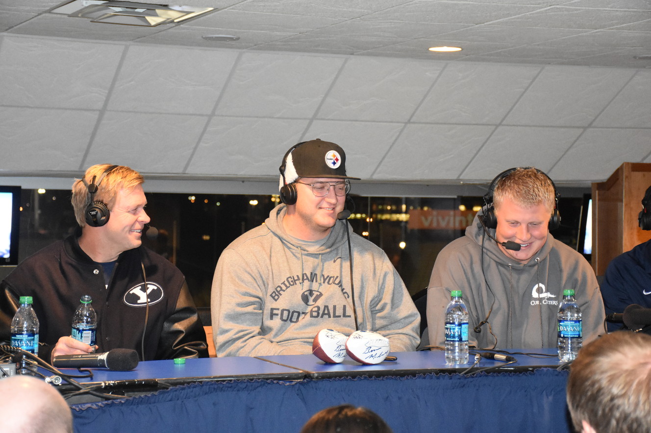 Senior offensive lineman Ryker Mathews, center, and tight end Remington Peck speak with the head coach during "BYU Football with Bronco Mendenhall" on Tuesday, Nov. 17, 2015. (Photo: Elora Grant, IMG)