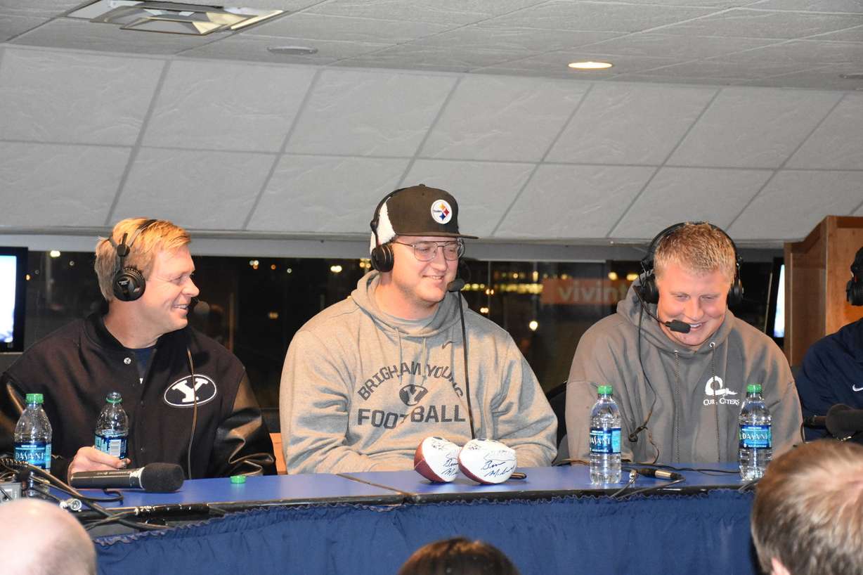 Senior offensive lineman Ryker Mathews, center, and tight end Remington Peck speak with the head coach during "BYU Football with Bronco Mendenhall" on Tuesday, Nov. 17, 2015. (Photo: Elora Grant, IMG)