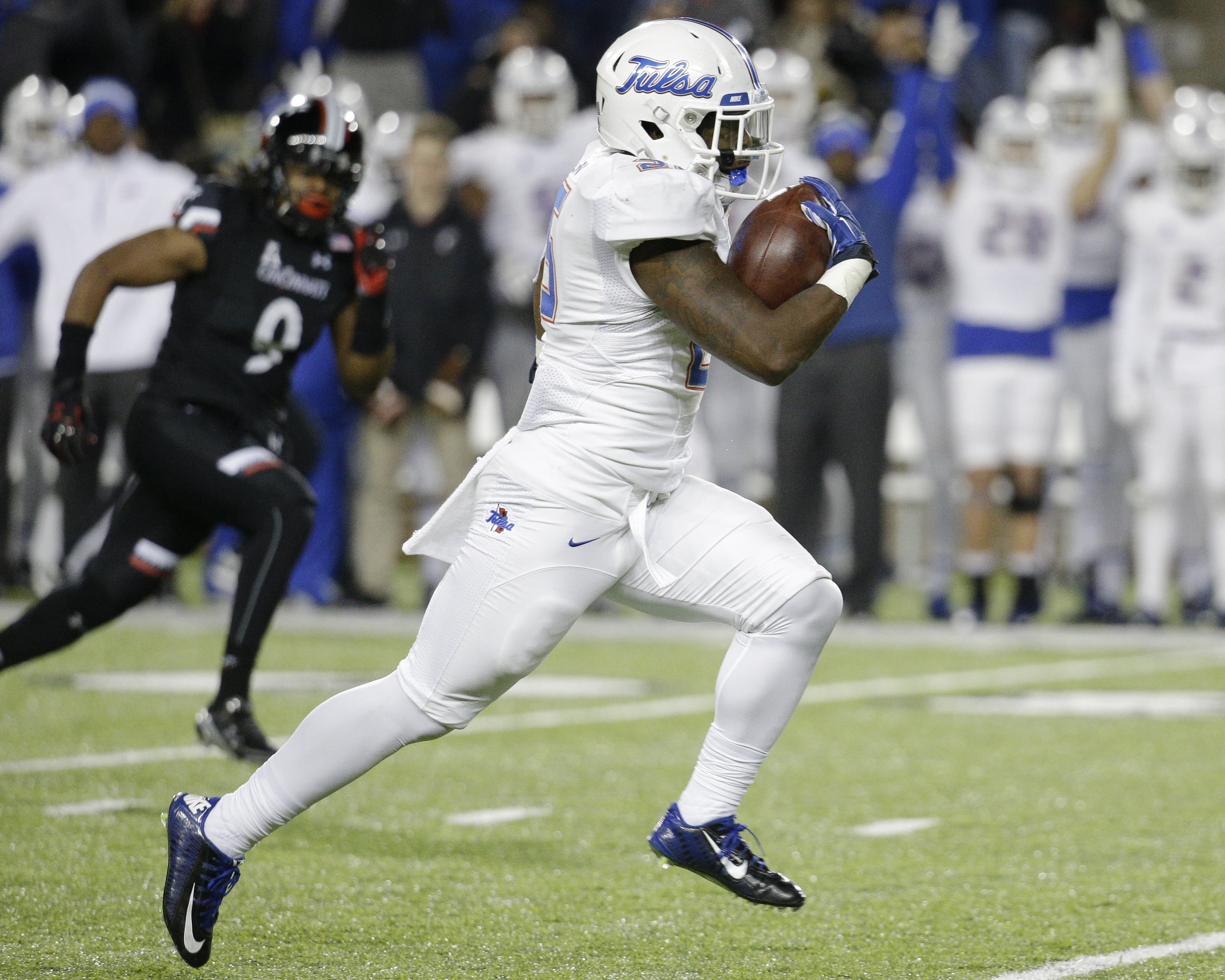 Navy triple option faces Tulsa's up-tempo spread