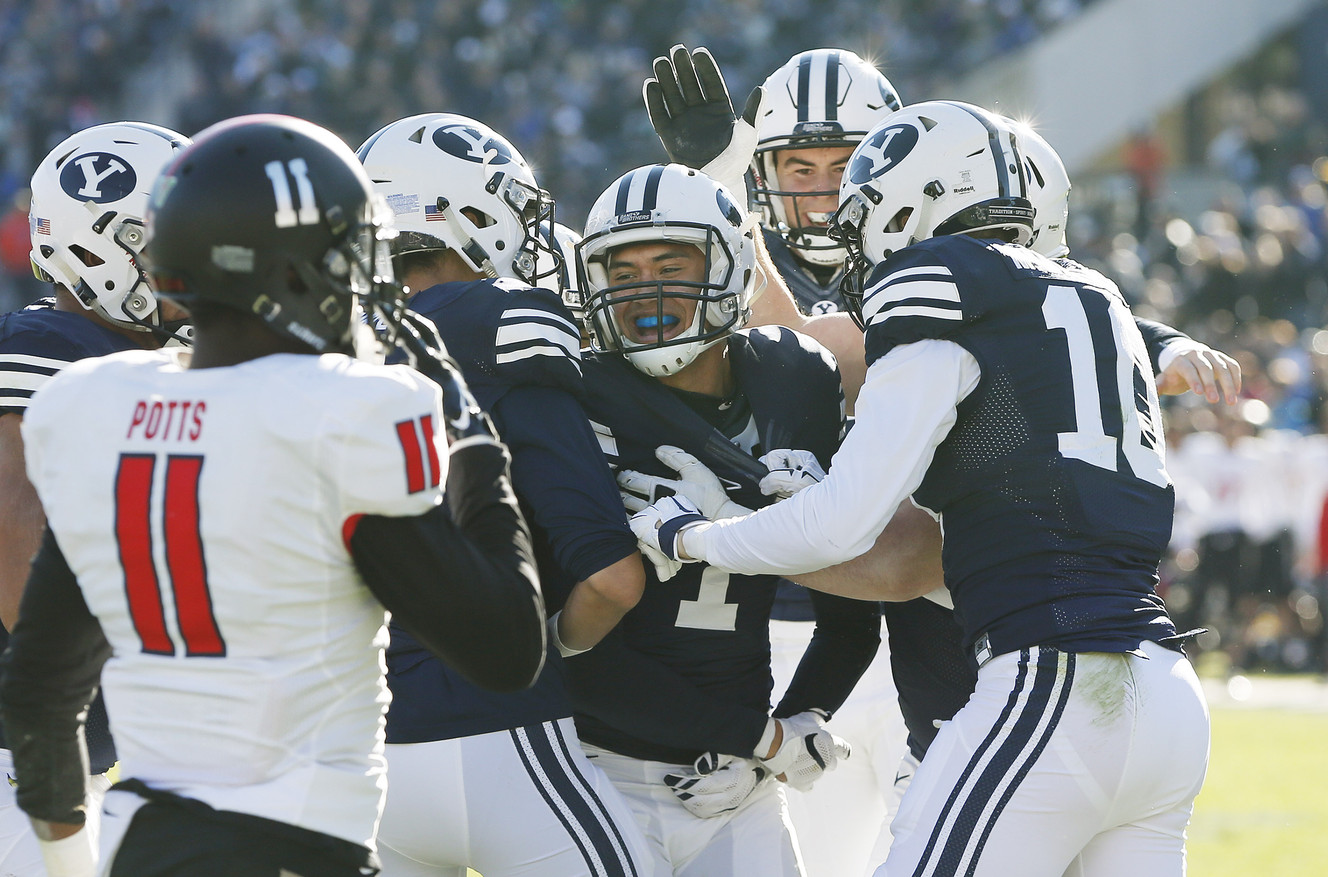 BYU wide receiver Moroni Laulu-Pututau (1) celebrates his touchdown with teammates against Fresno in Provo, Nov. 21, 2015. (Photo: Jeffrey D. Allred, Deseret News)