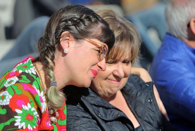 Kate Kelly hugs her mother Donna Kelly after Donna spoke at the Rally for Love, Equality, Family, and Acceptance outside of the state Capitol in Salt Lake City on Saturday, Nov. 21, 2015. (Photo: Kristin Murphy)