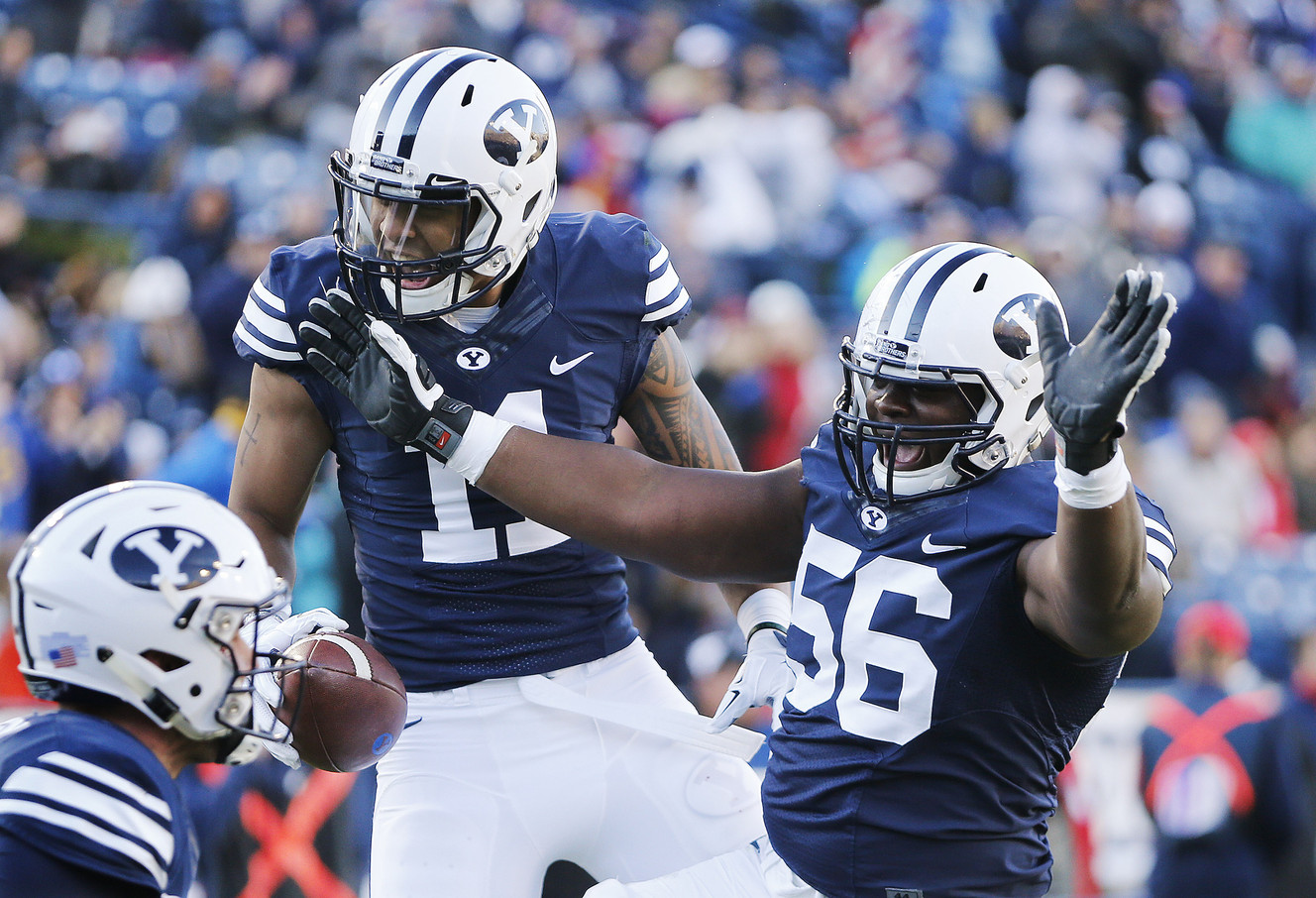 BYU wide receiver Terenn Houk (11) celebrate his score against Fresno in Provo Saturday, Nov. 21, 2015. BYU won 52-10. (Photo: Jeffrey D. Allred, Deseret News)