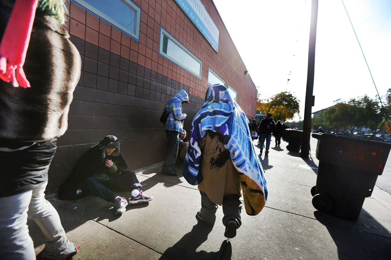Homeless gather near St. Vincent De Paul Dining Hall in Salt Lake City on Monday, Nov. 23, 2015. (Photo: Scott G Winterton, Deseret News)