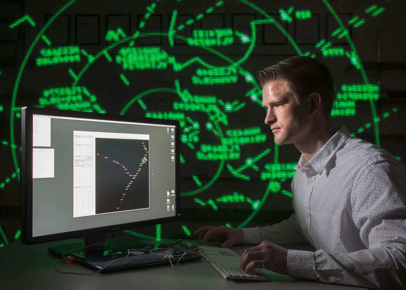 Computer science student Andrew Wallace is working with NASA to improve air traffic congestion by designing simulations that imitate the workload of air traffic controllers. He's had to comprehensively cover the ins and outs of every possible aircraft &mdash; including personal drones &mdash; that could enter the airspace over New York's LaGuardia Airport. (Photo: Mark A. Philbrick/BYU)