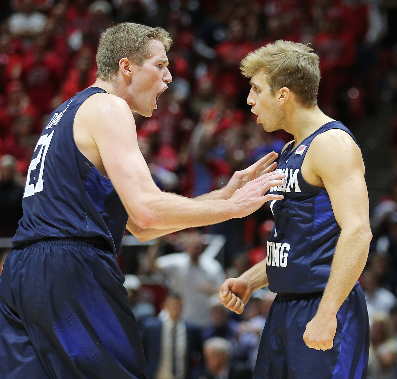 BYU forward Kyle Davis (21) will be among the newcomers relying on BYU guard Chase Fischer (1) to help navigate a tricky road atmosphere at Gonzaga on Thursday. (Photo: Scott G Winterton, Deseret News)