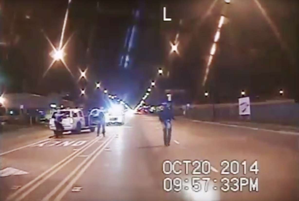 FILE - In this Oct. 20, 2014 frame from dash-cam video provided by the Chicago Police Department, Laquan McDonald, right, walks down the street moments before being shot by officer Jason Van Dyke in Chicago. (Photo: AP Photo)