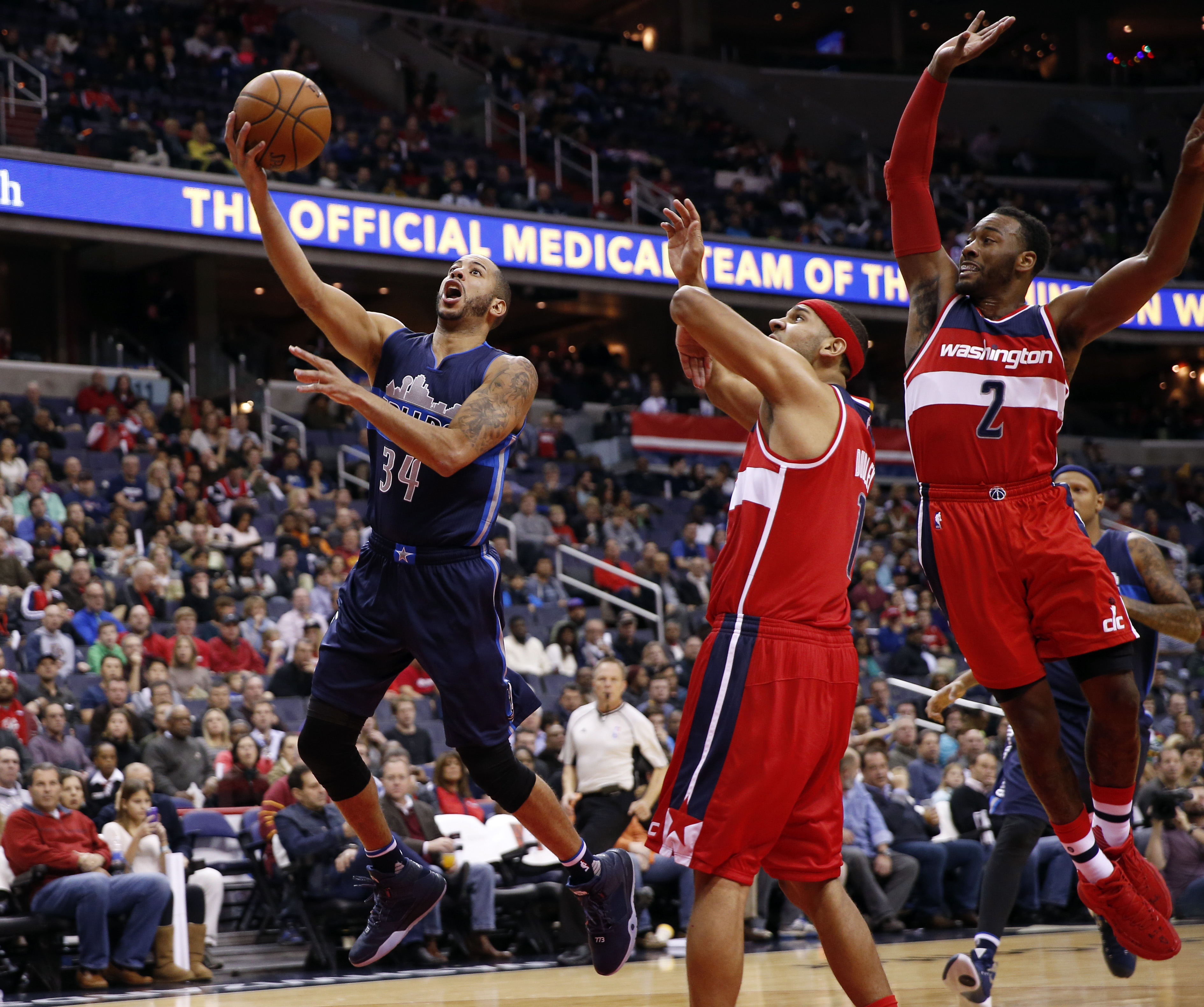 Matthews scores 36 points, Mavericks beat Wizards 116-104