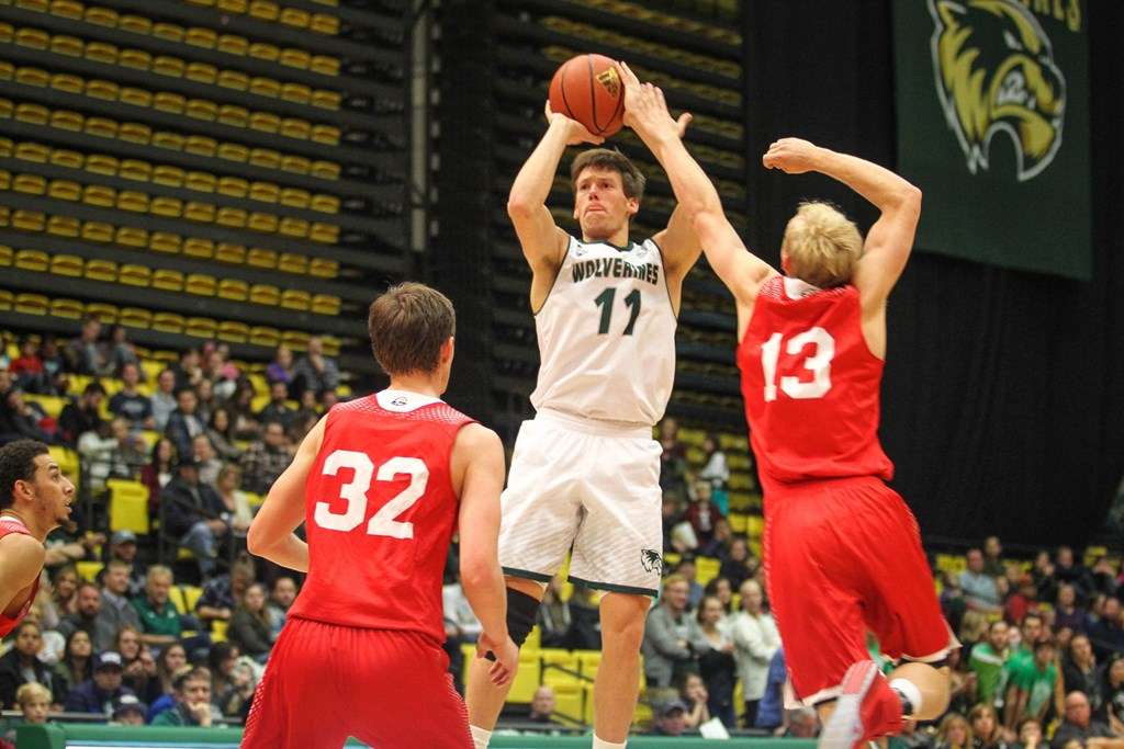 Utah Valley's Konner Frey shoots over a Southern Utah defender at the UCCU Center in Orem Dec. 5, 2015. (Photo: Linsey McClain, UVU Athletics)