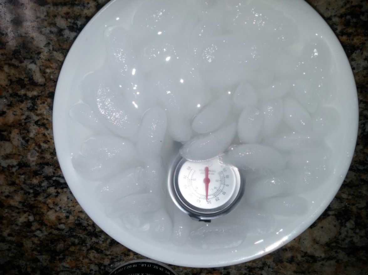 Add some salt to the water and the temperature reads four degrees cooler than before. (Photo: Susan Jeppesen)