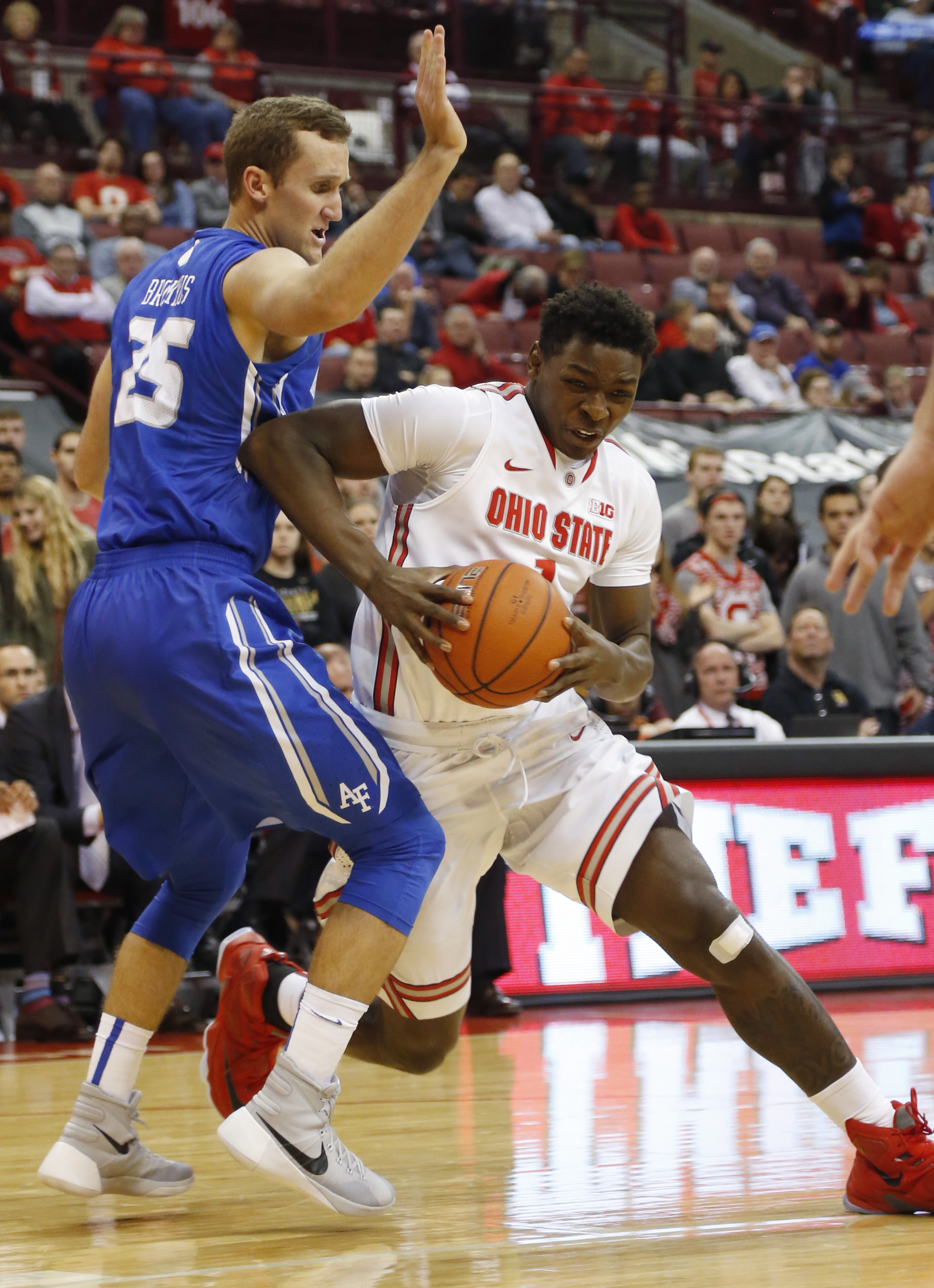 Loving scores 18; Ohio State cruises past Air Force 74-50