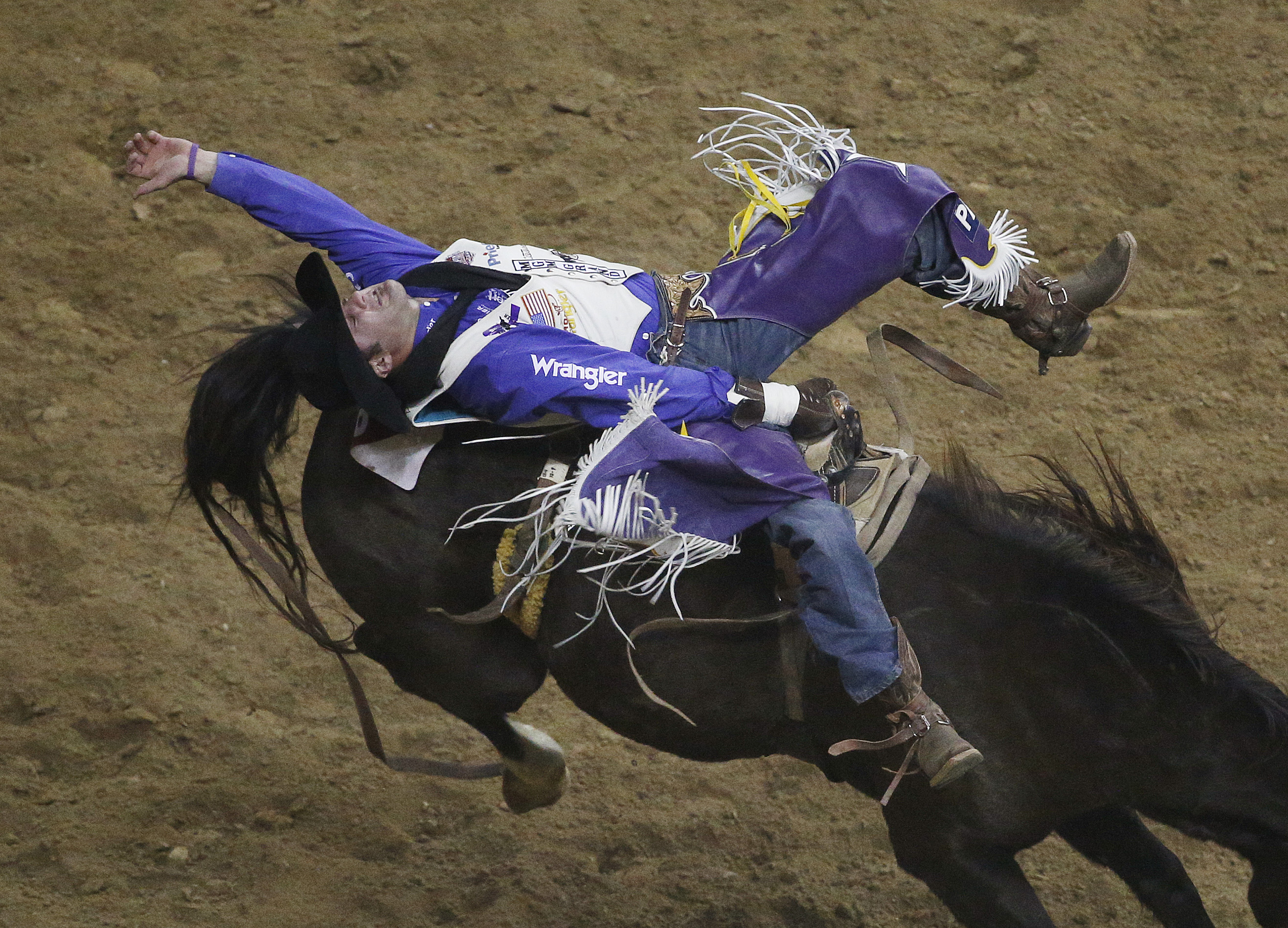 McDonald takes over 1st in world standings at NFR