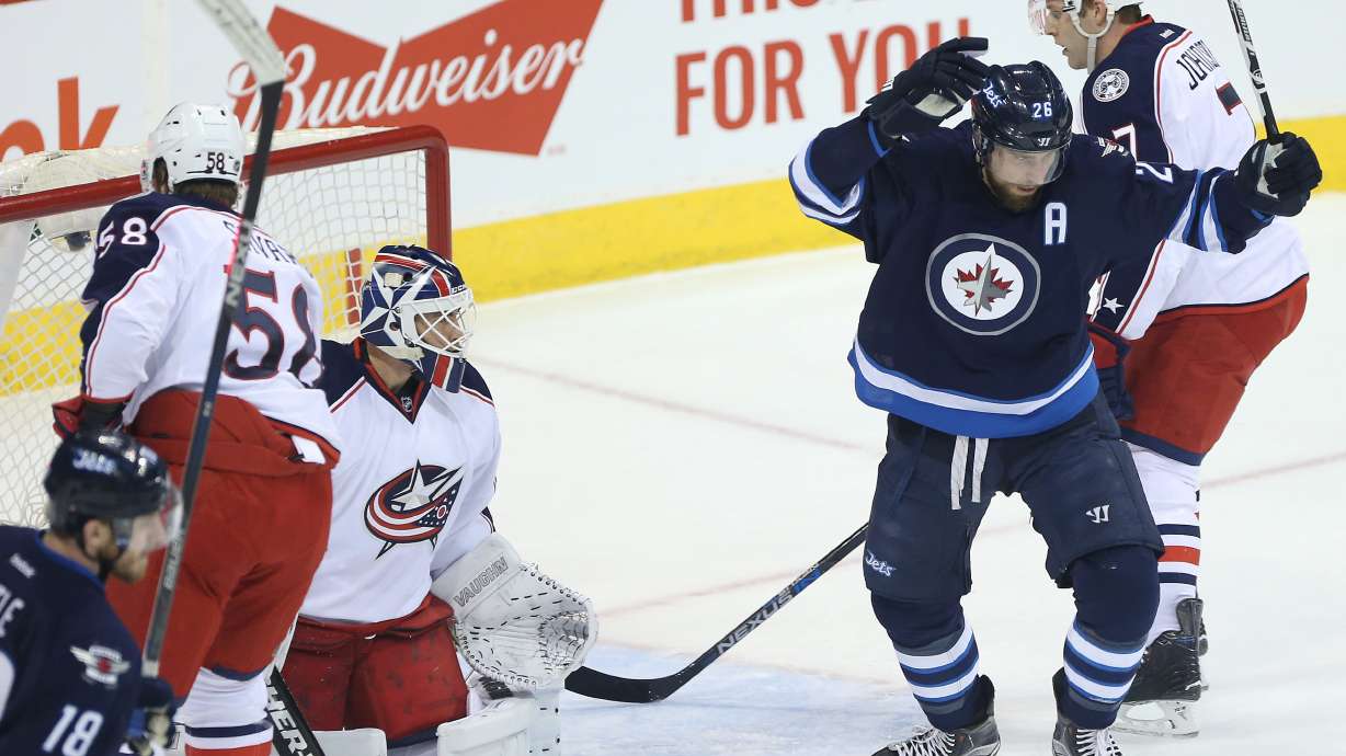 Perreault has goal, 3 assists and Jets beat Blue Jackets 6-4