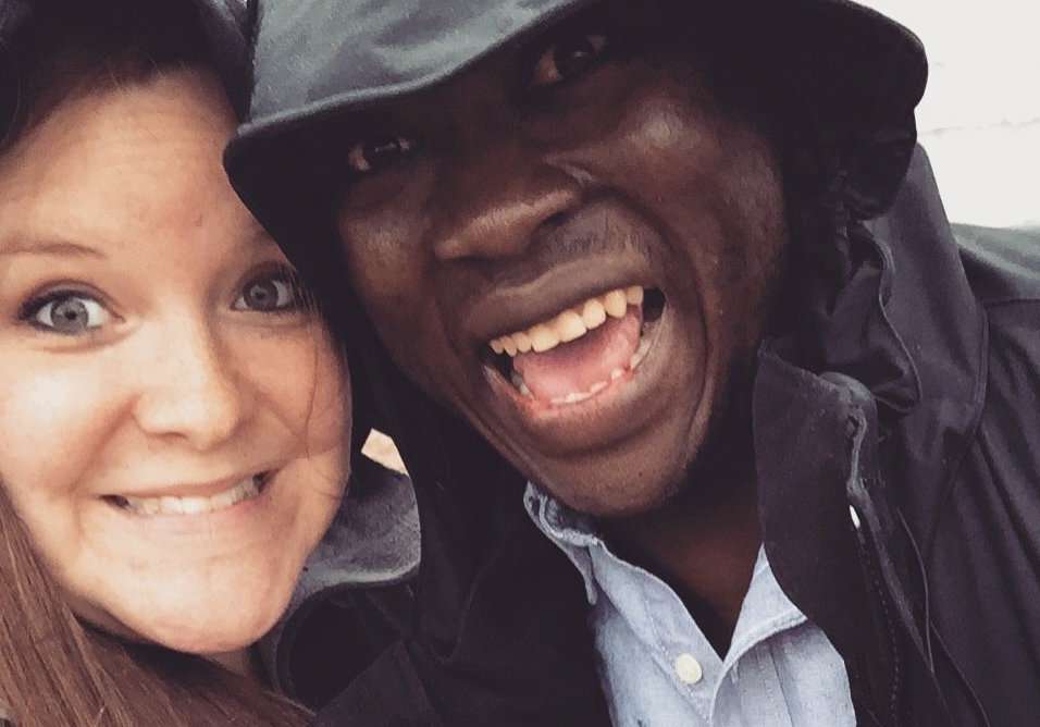 Kristin and Eric Njimegni take a selfie in the rain. The couple met in Moscow while studying and working abroad. (Photo: Al Hellmann/CNN iReport)
