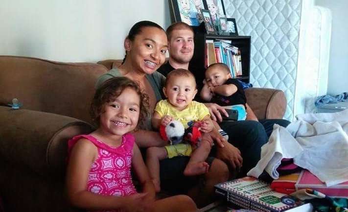 Daniel and Natalie Martinez-Vlasoff pose with their three children in their home in Los Angeles in 2014. The couple welcomed a fourth child in November. (Photo :Natalie Martinez-Vlasoff/CNN iReport)