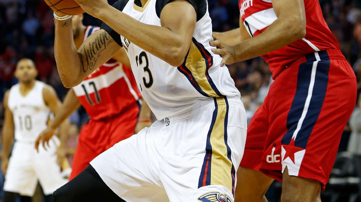 Evans scores 27 points, Pelicans beat Wizards 107-105