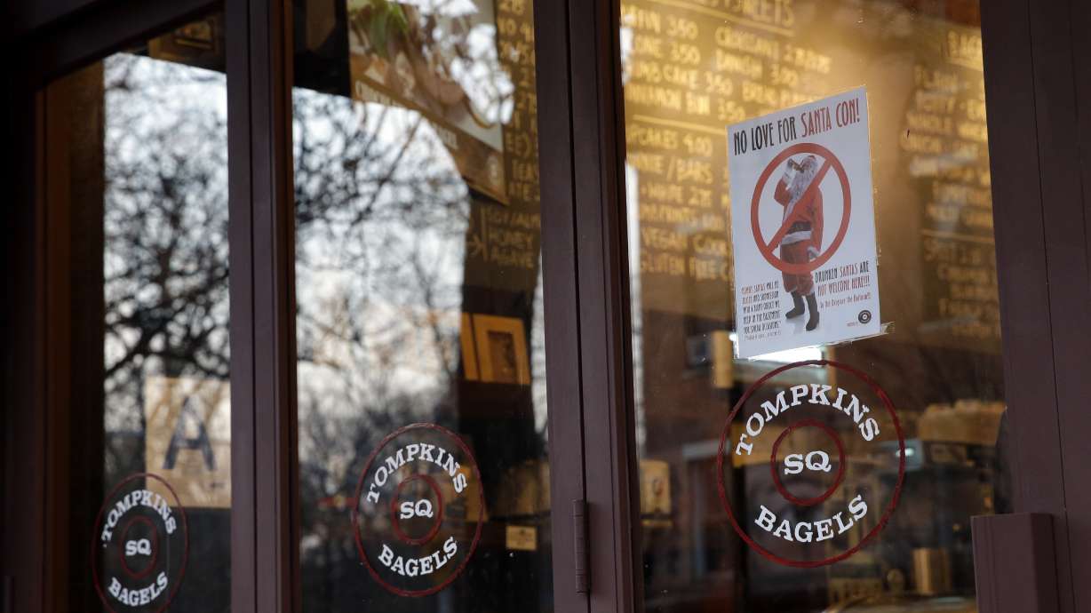 Thousands in costumes revel at festive SantaCon