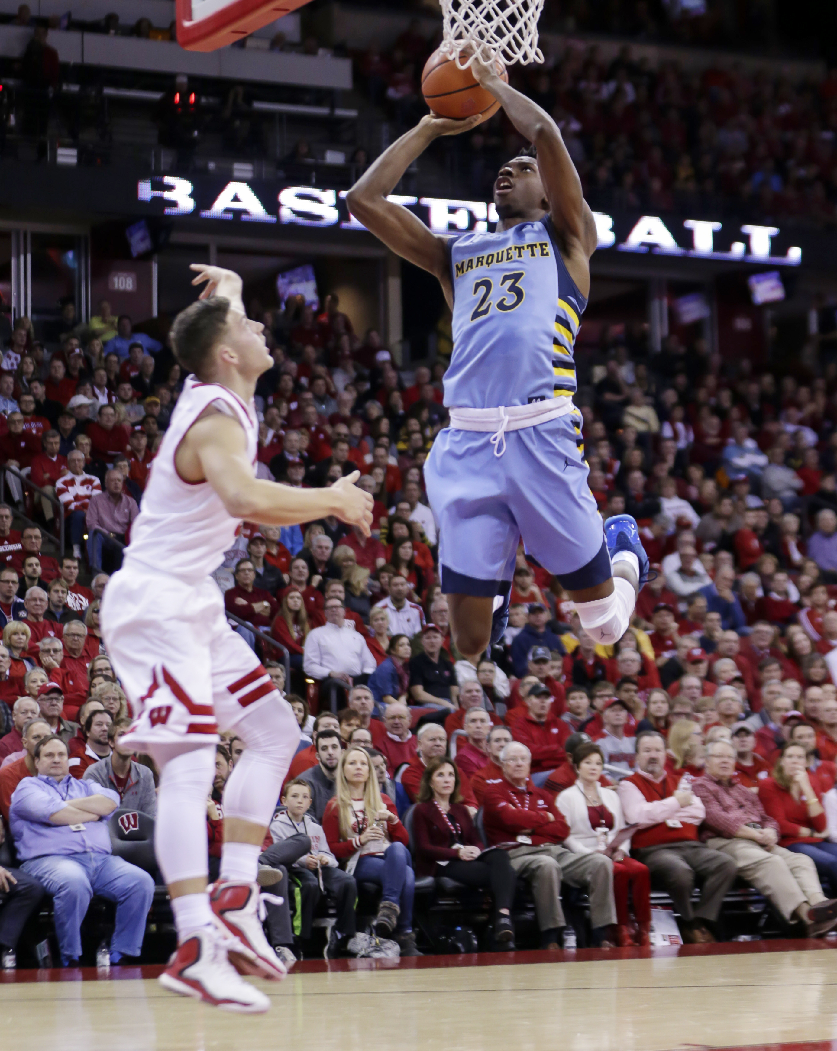 Marquette holds on to beat in-state rival Wisconsin 57-55