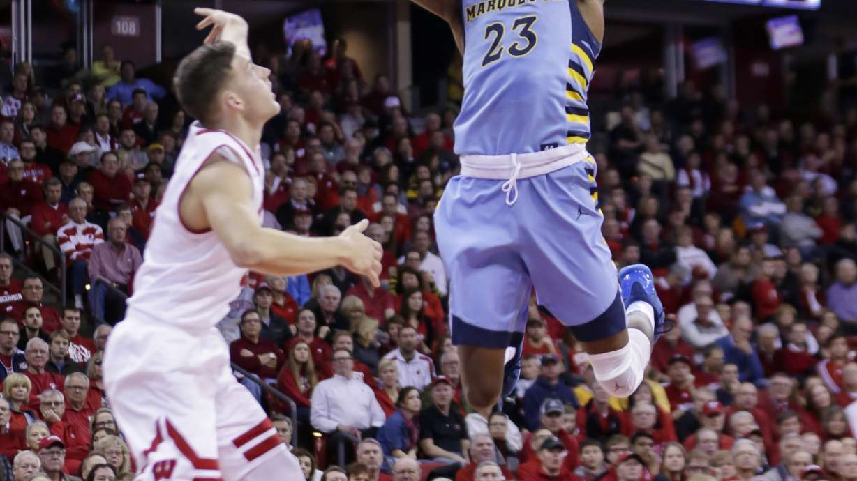 Marquette holds on to beat in-state rival Wisconsin 57-55