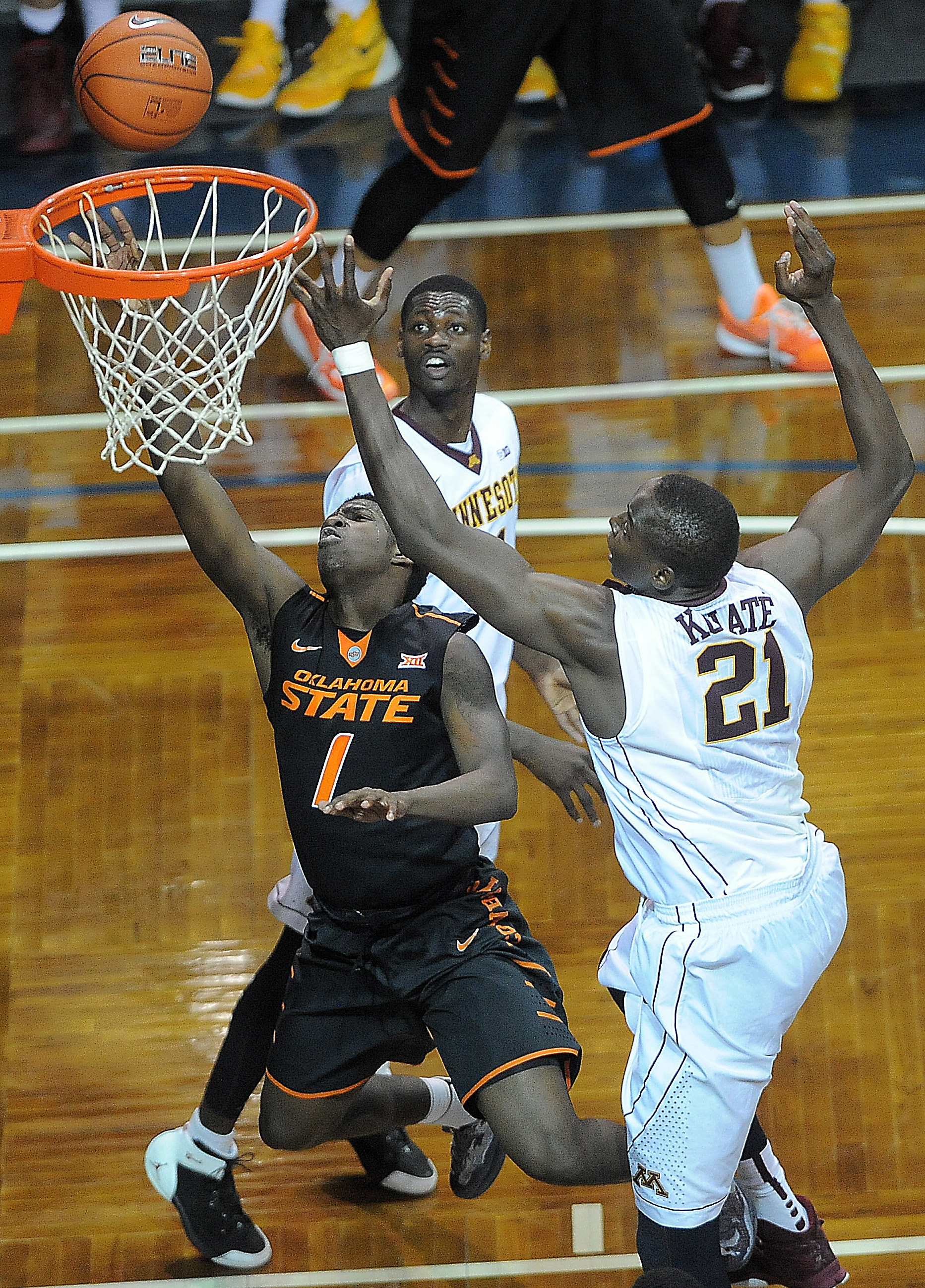 Carroll leads Oklahoma State over Minnesota 62-60