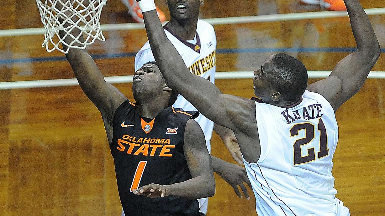 Carroll leads Oklahoma State over Minnesota 62-60