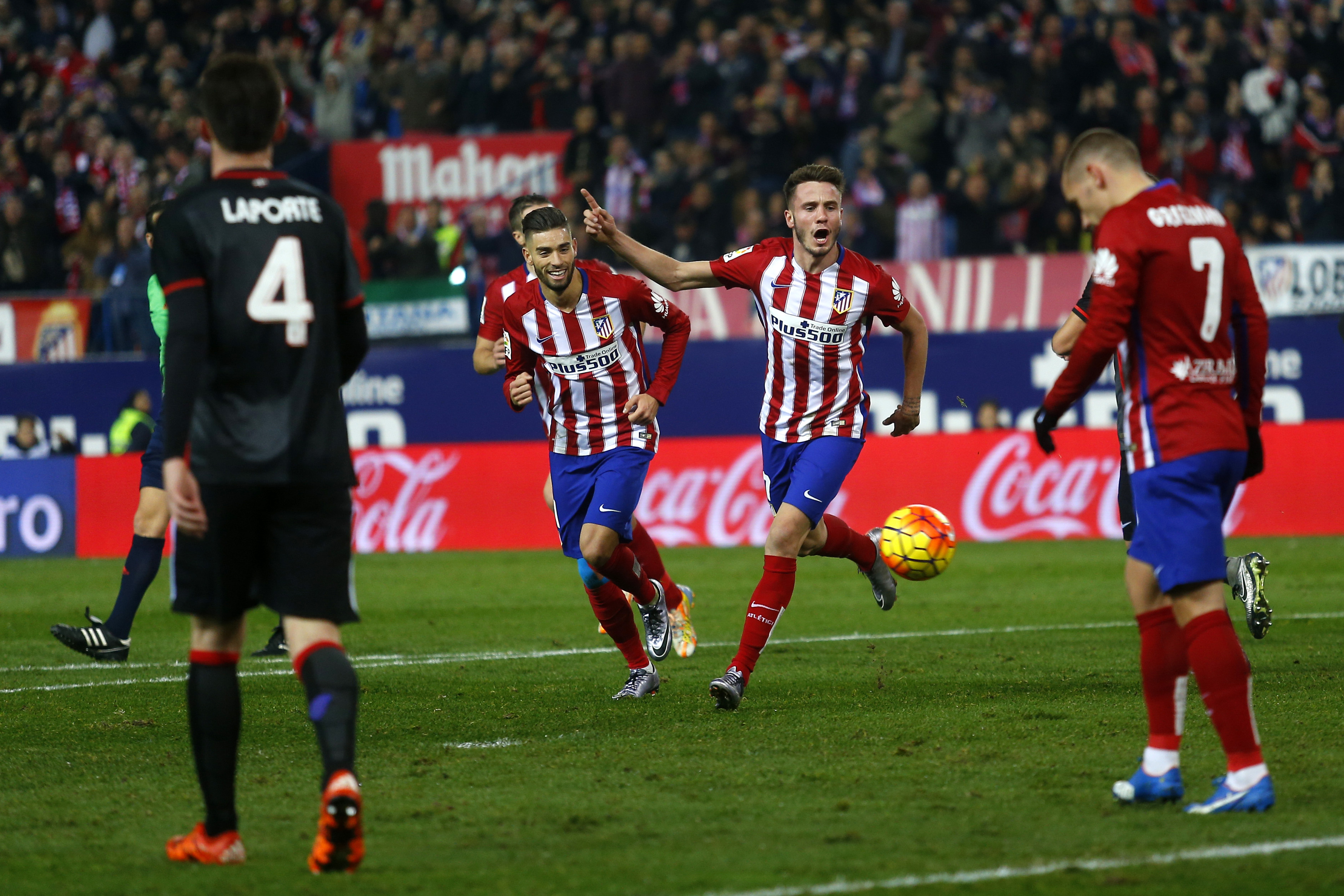 Atletico pulls even with Barca at top of Liga, Madrid loses