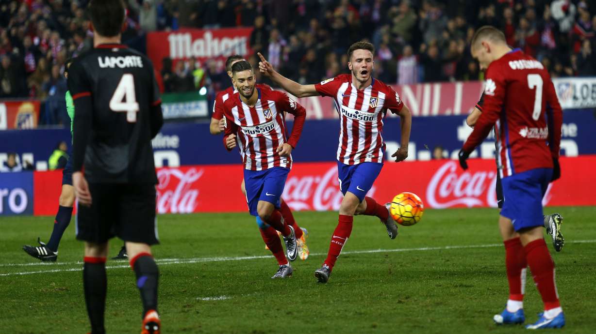 Atletico pulls even with Barca at top of Liga, Madrid loses