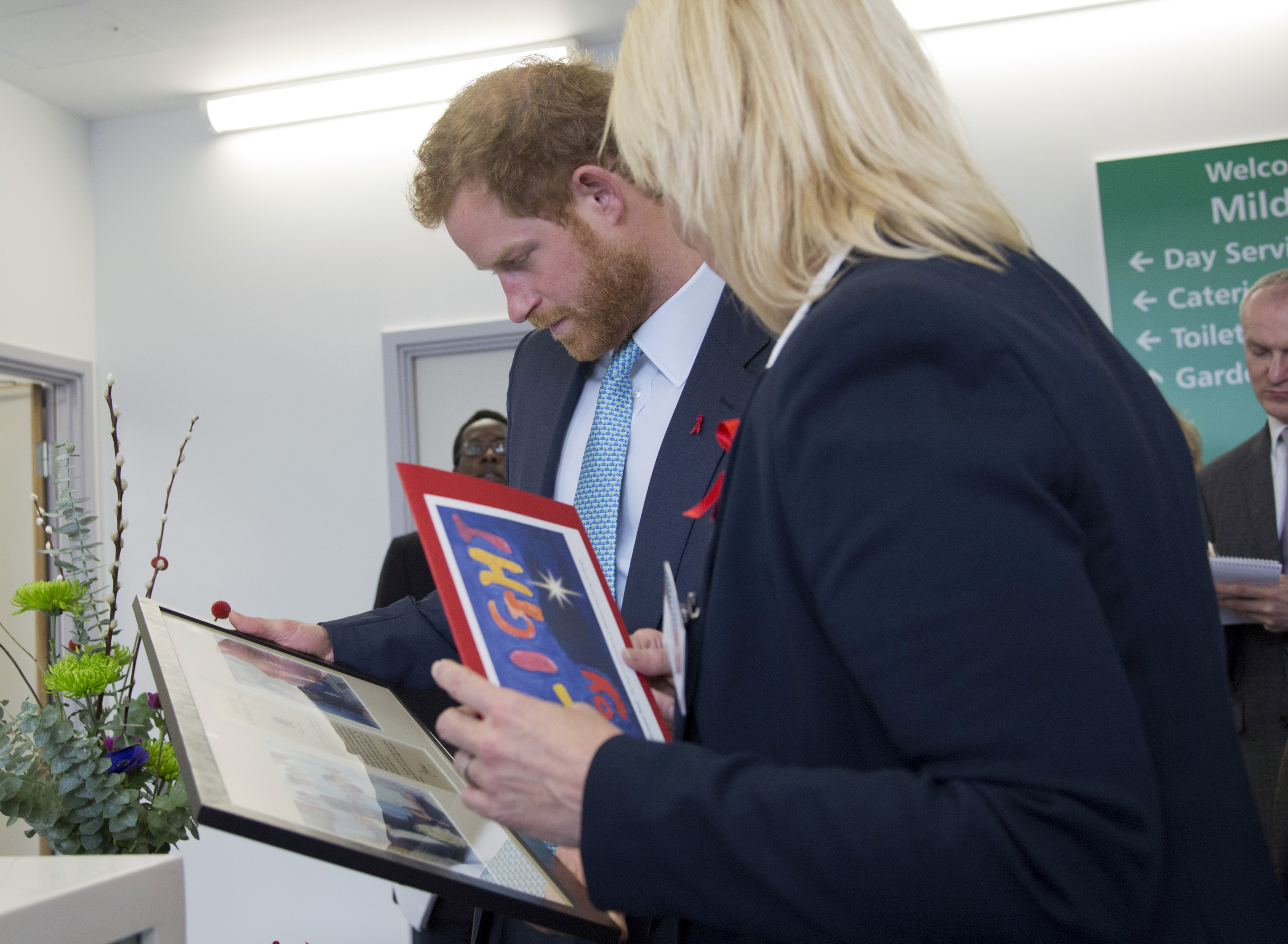 Prince Harry sees mother's legacy on visit to HIV hospital
